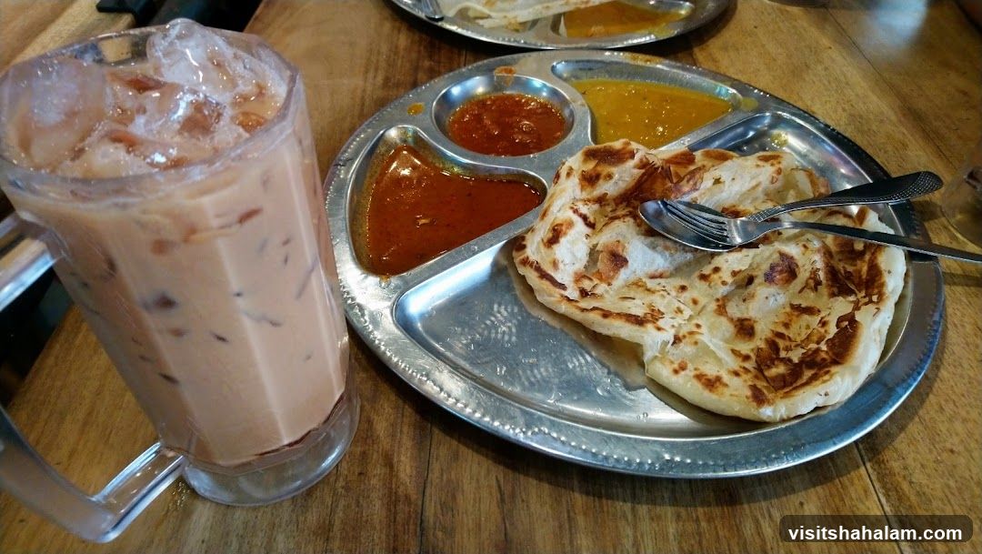 Roti Canai with Curry and Iced Tea