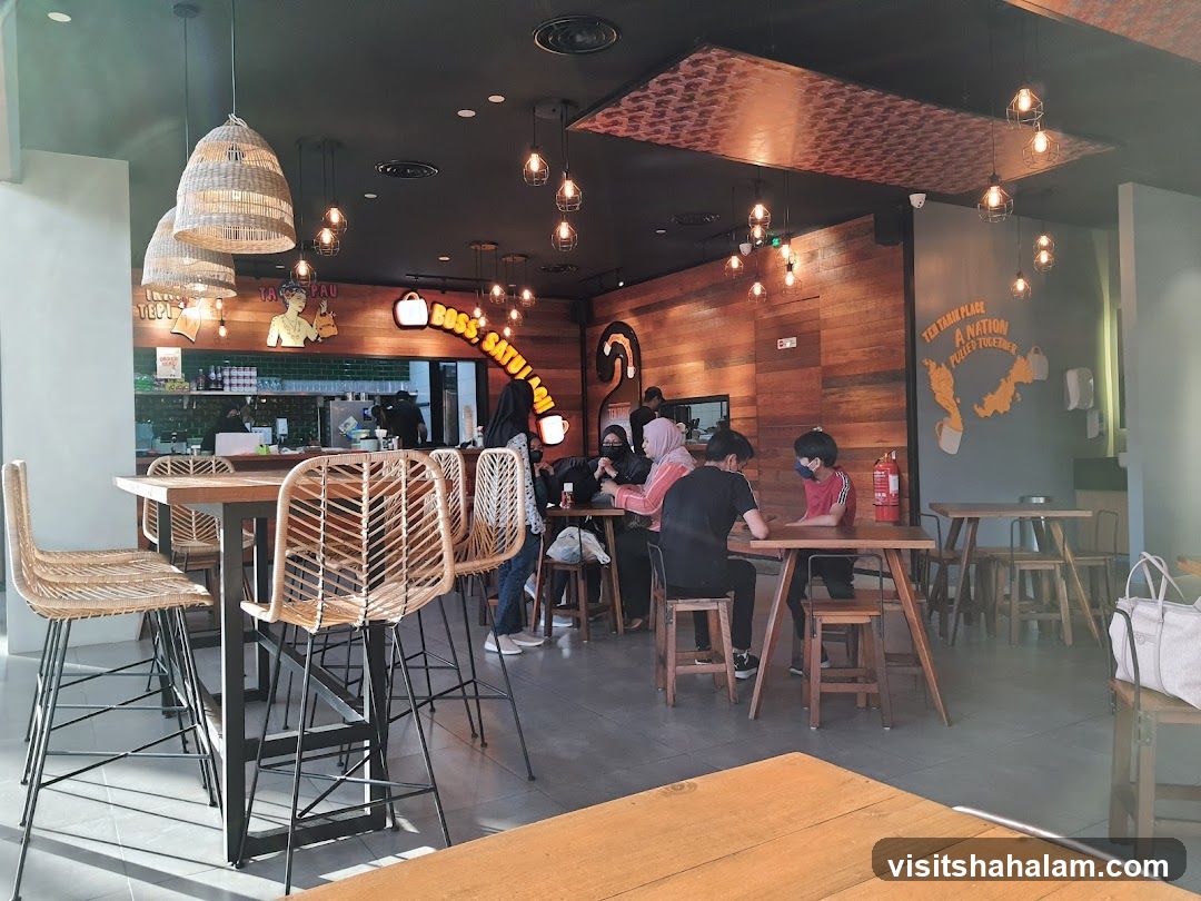Interior of a restaurant with wooden accents and modern lighting