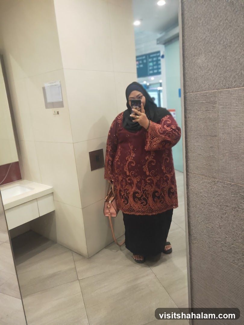 Woman taking a mirror selfie