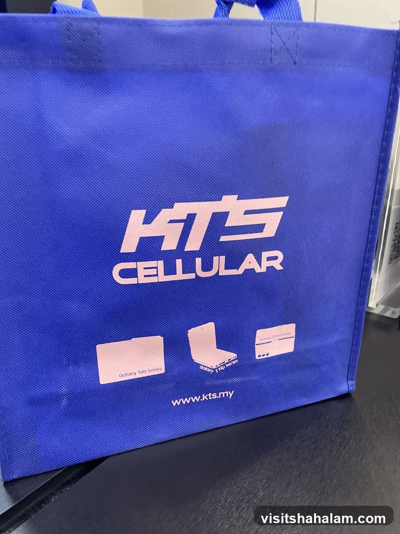 Blue tote bag with KTS Cellular logo