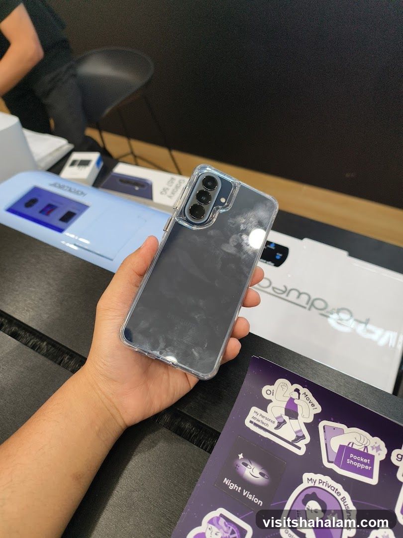 Person holding a smartphone with a clear case