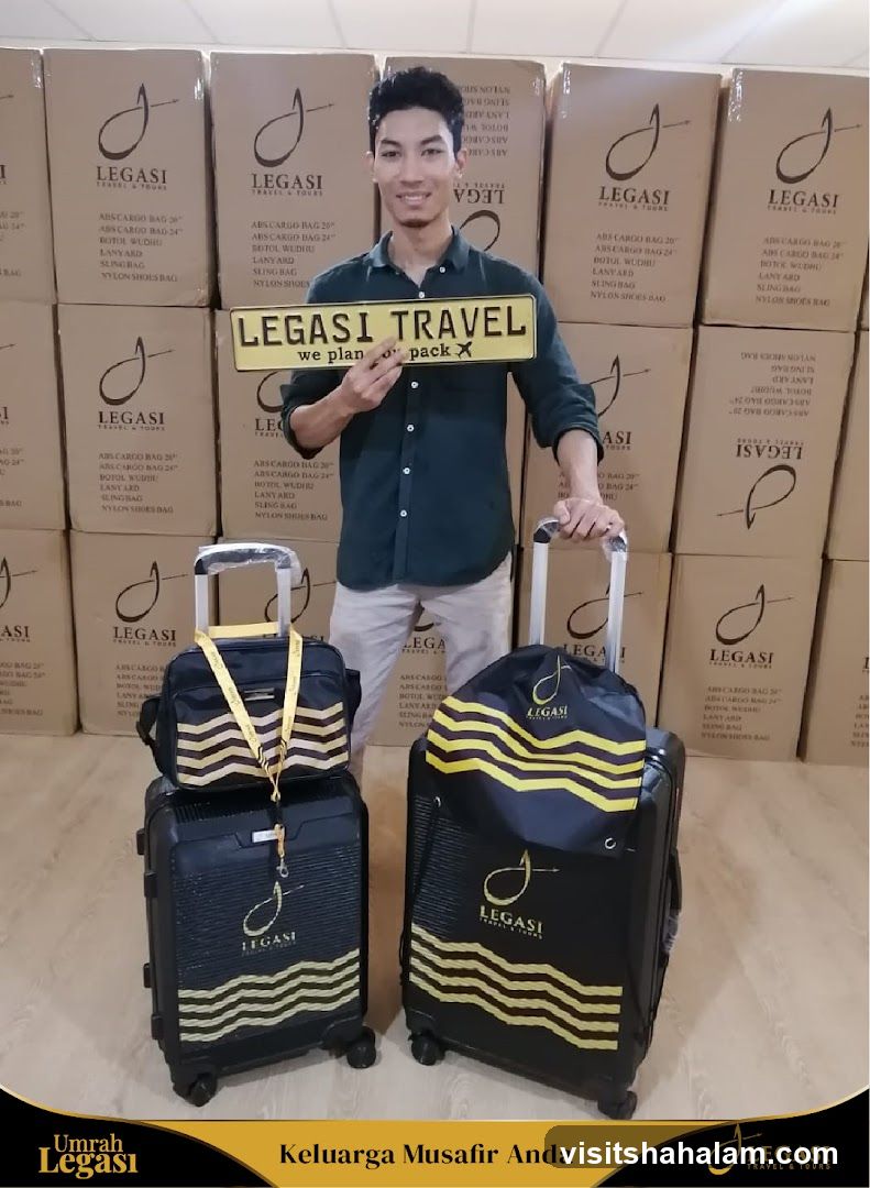 Man holding a sign with luggage