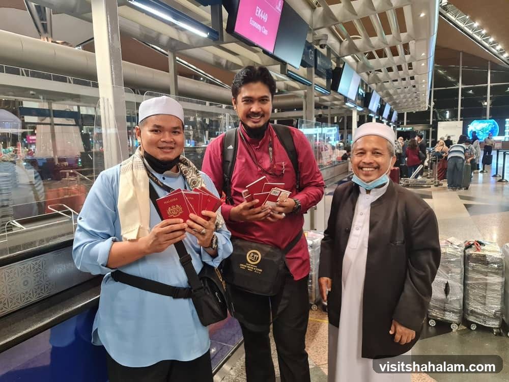 Travelers with Passports at Airport