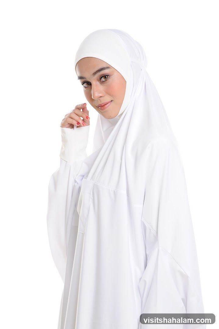 Woman in white prayer garment
