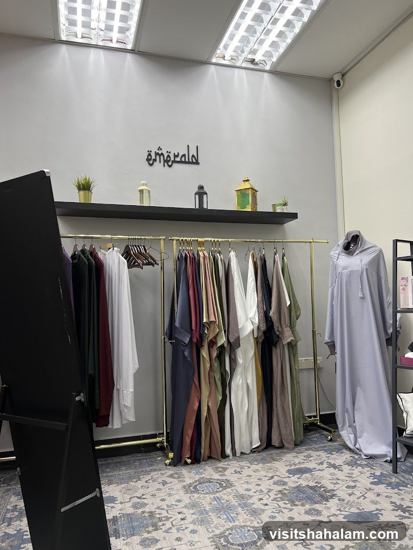 Clothing store interior with abayas on display