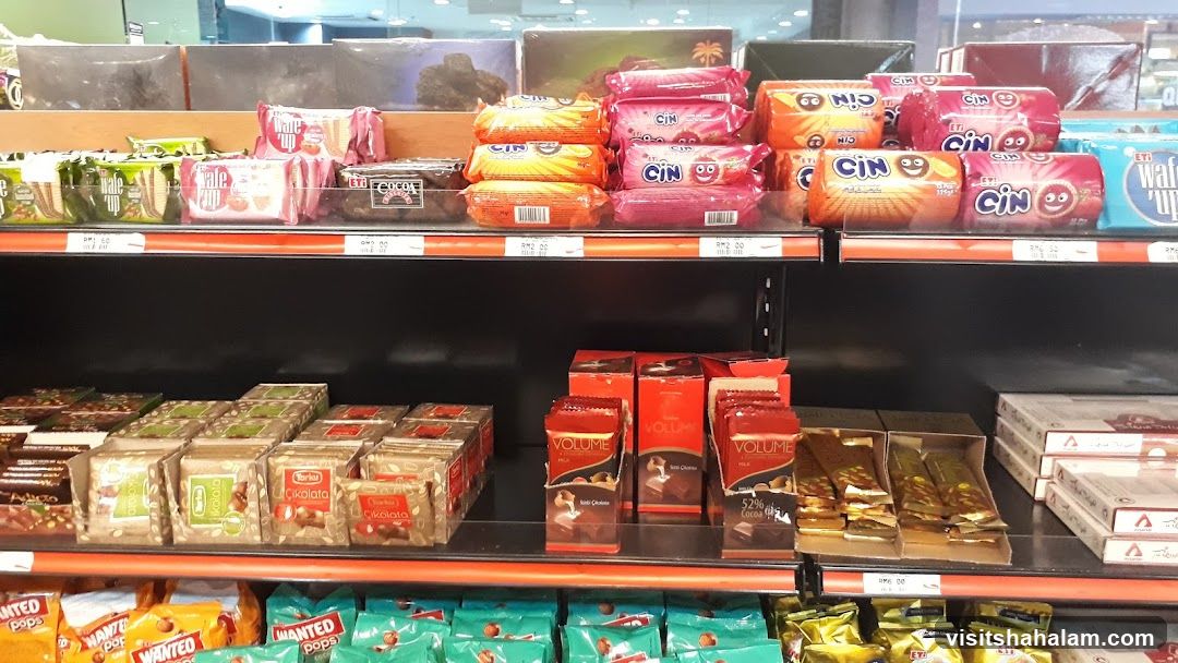 Assortment of Packaged Snacks and Chocolates