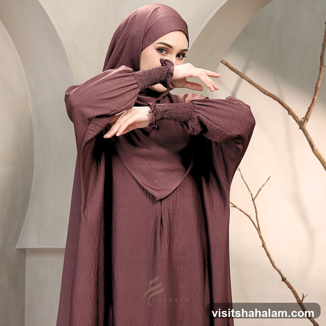 Woman in Maroon Abaya