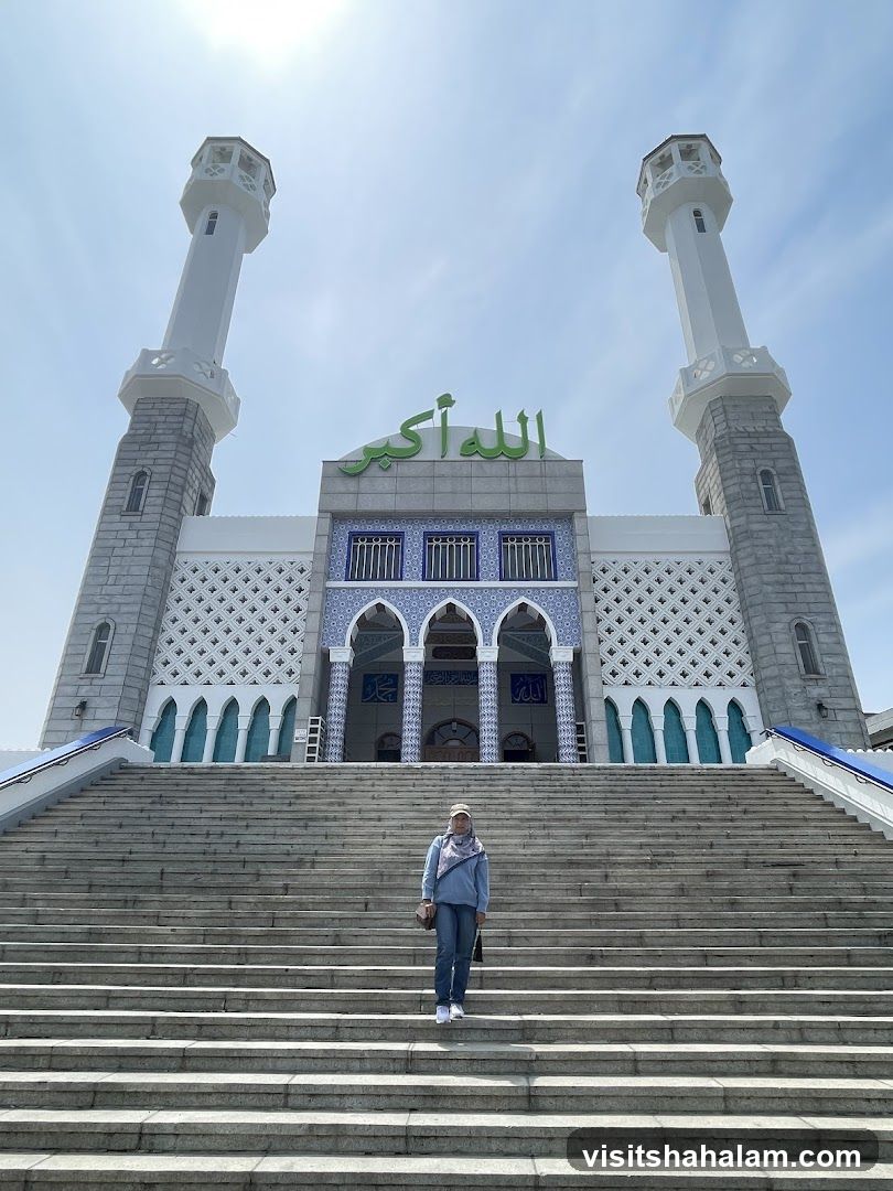 Mosque with Minarets and Arabic Calligraphy