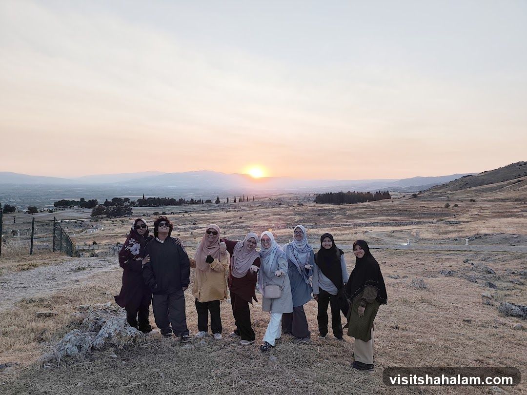 Group of people at sunset
