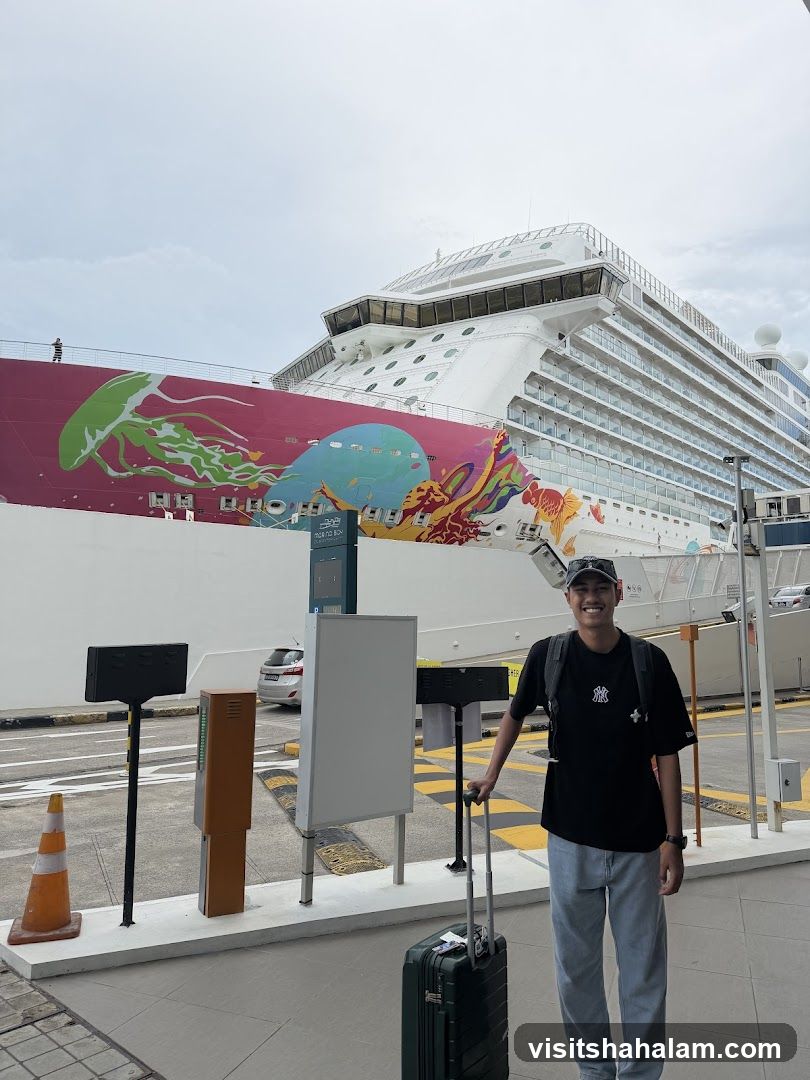 Man with Suitcase in Front of Cruise Ship