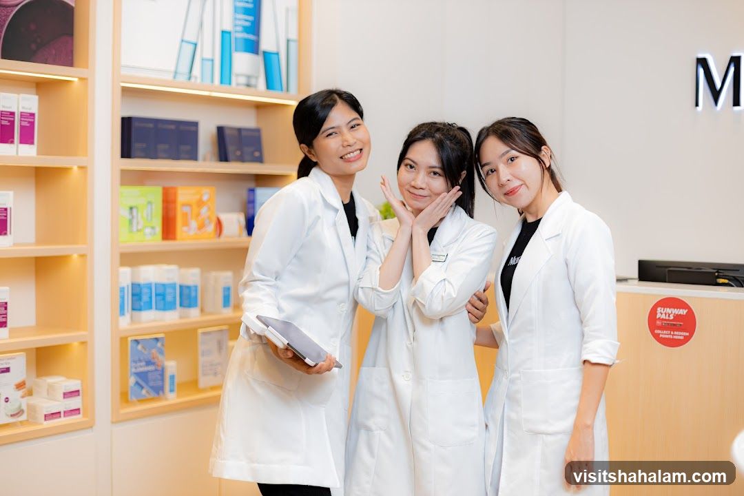 Three women in lab coats