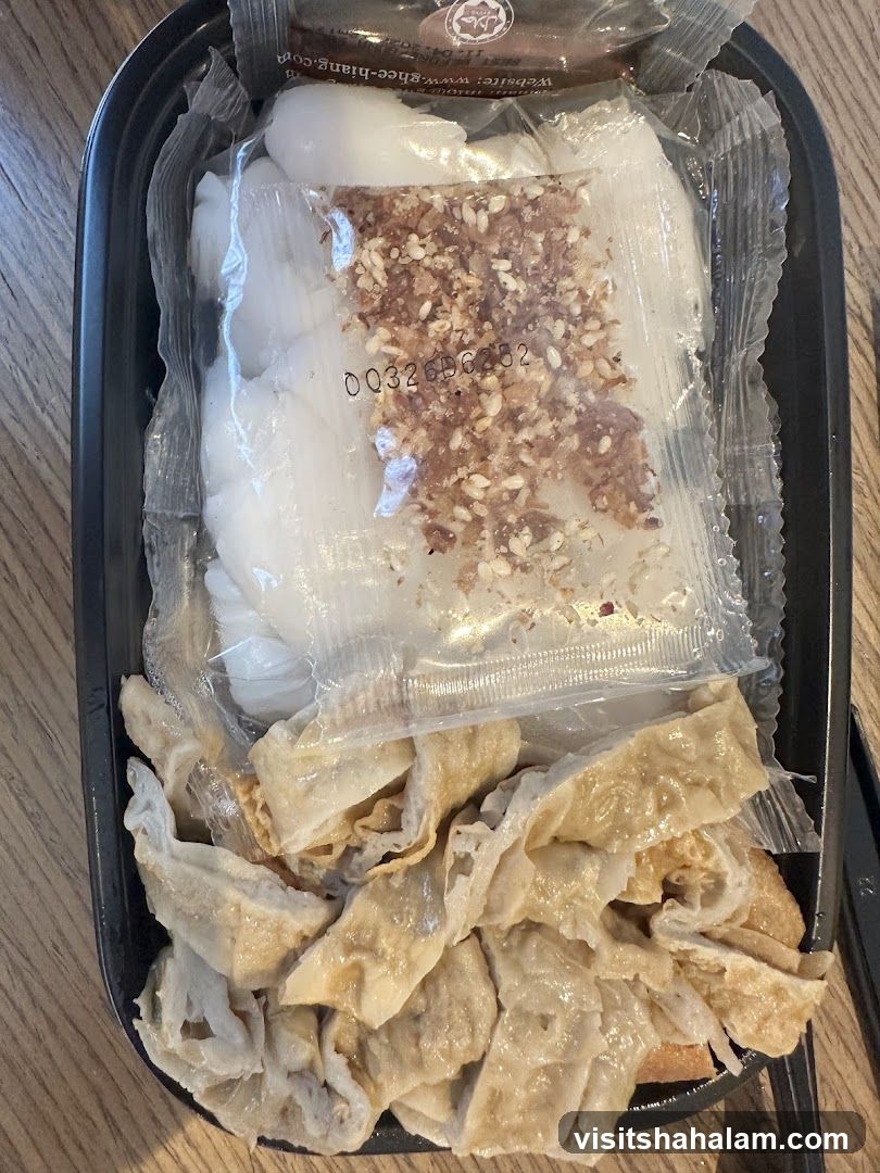Food Container with Noodles and Toppings