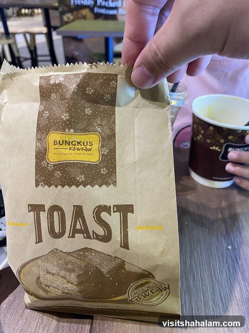 Paper bag with "TOAST" logo