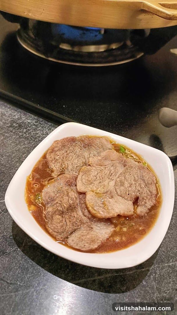 Thinly Sliced Beef in Broth