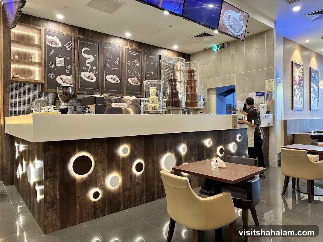 Dessert shop counter with chocolate fountains