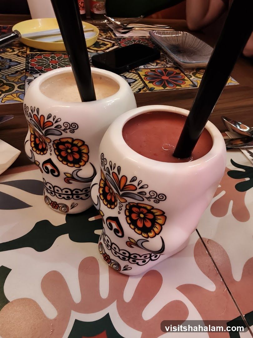 Skull-shaped drinkware with beverages