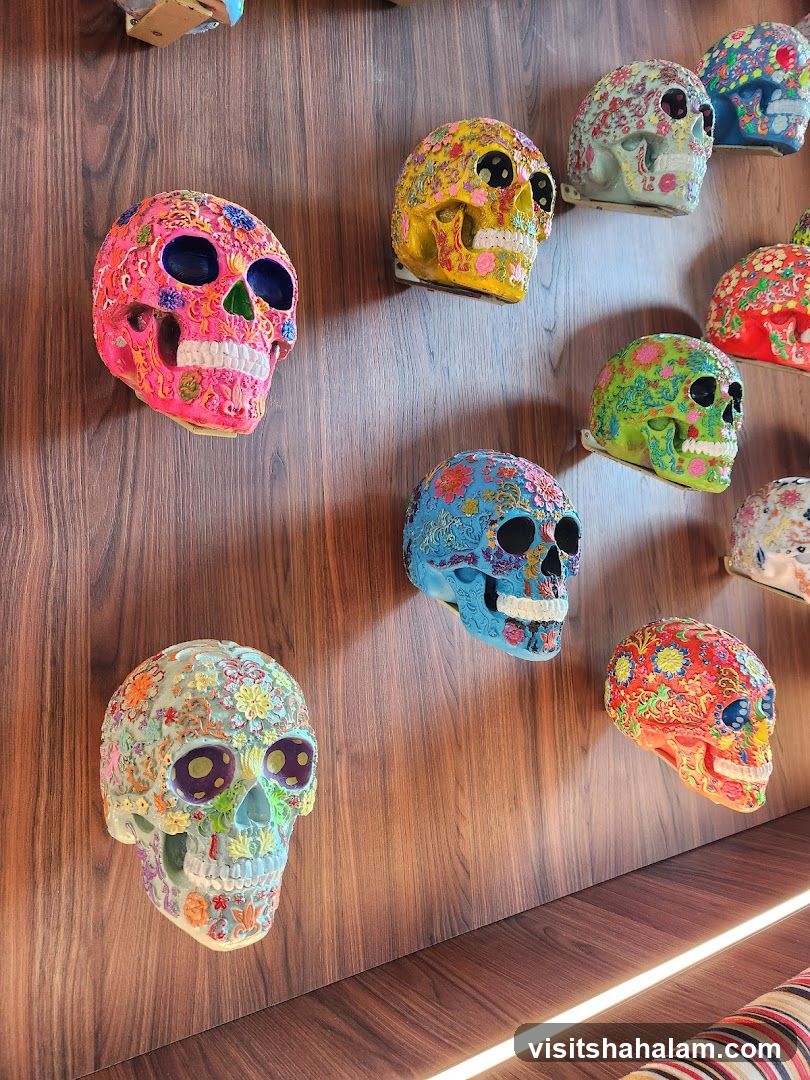 Decorated Skulls on Wooden Wall