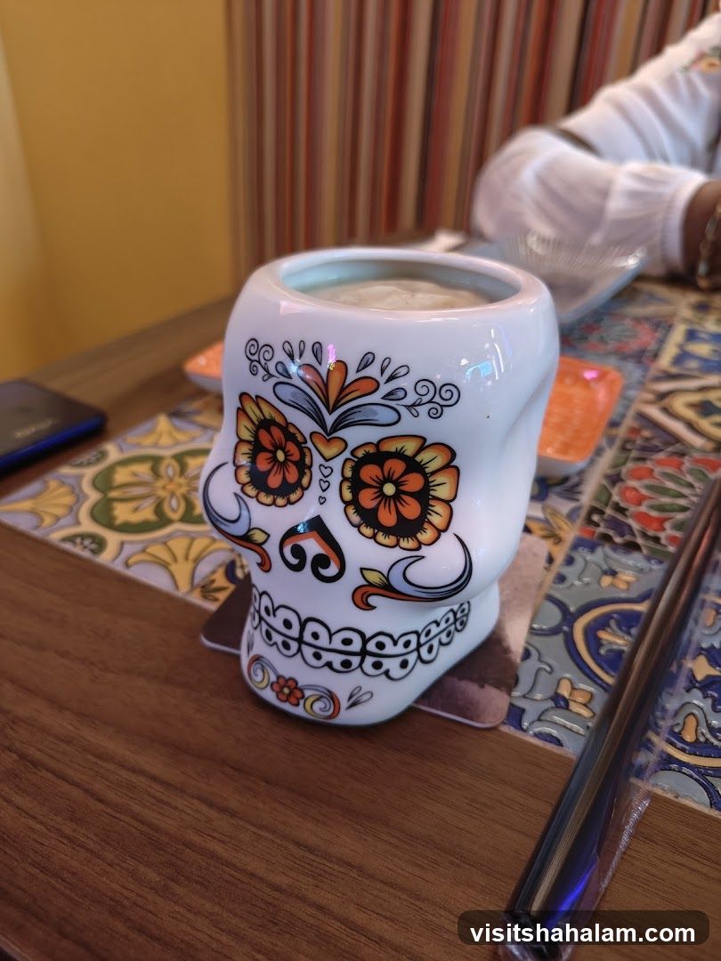 Skull-shaped mug with drink