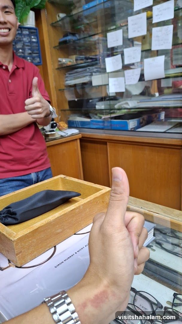 Thumbs Up in an Optical Shop