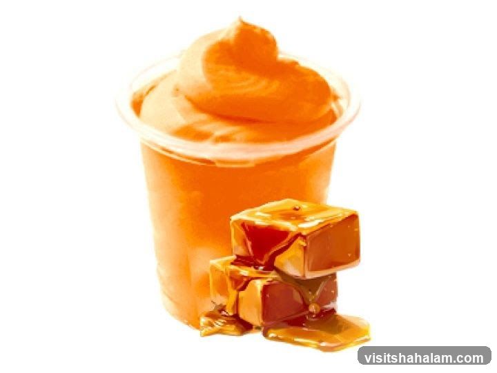 Orange Swirl Drink with Caramel Candies