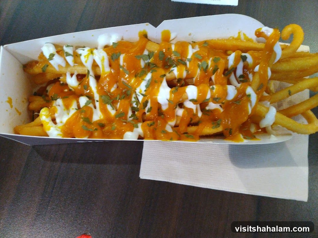 Fries with sauce and herbs