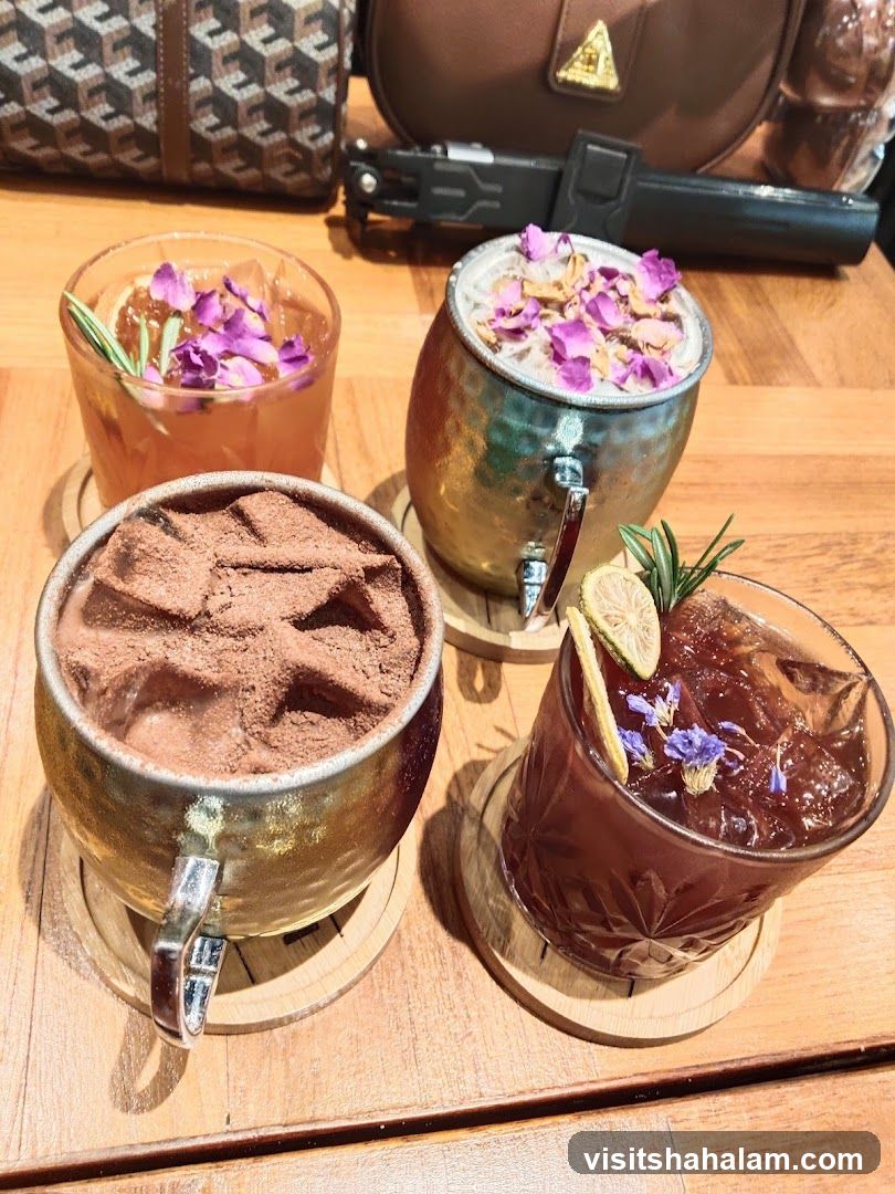 Four drinks on a wooden table