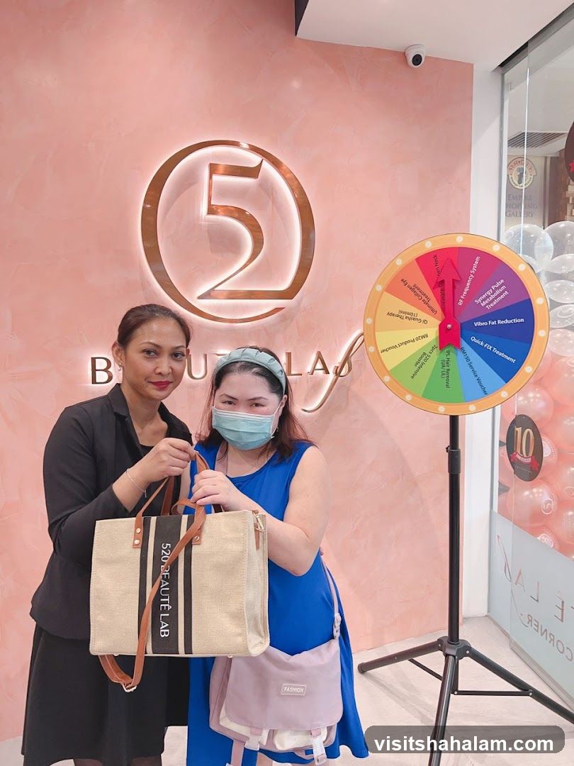 Two women with bags and a prize wheel