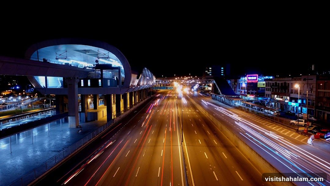 Nighttime Highway and Train Station