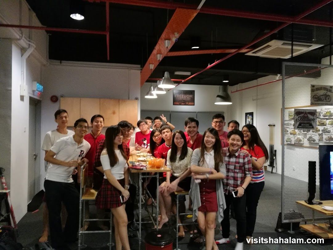 Group of people gathered around a table