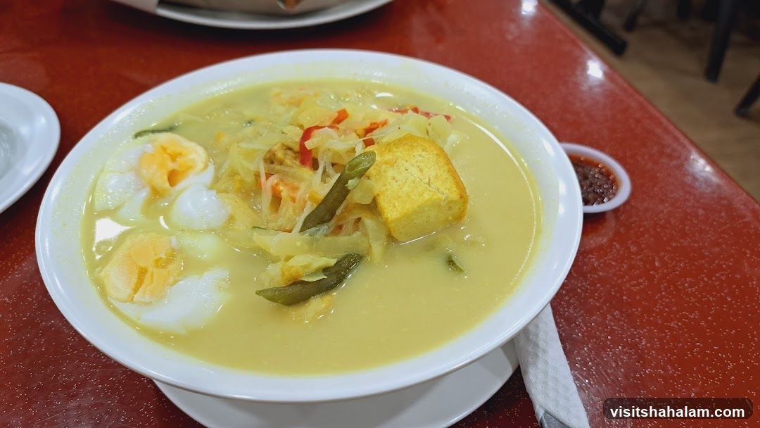 Bowl of Curry with Eggs and Tofu