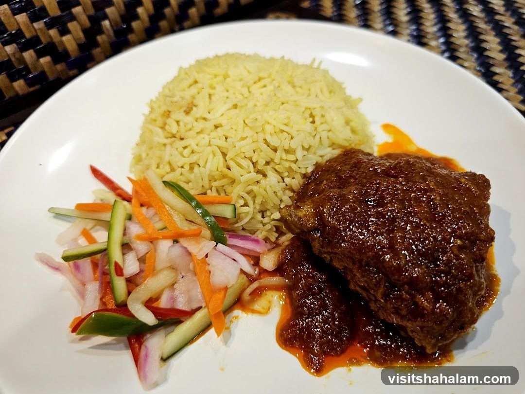 Chicken dish with rice and salad