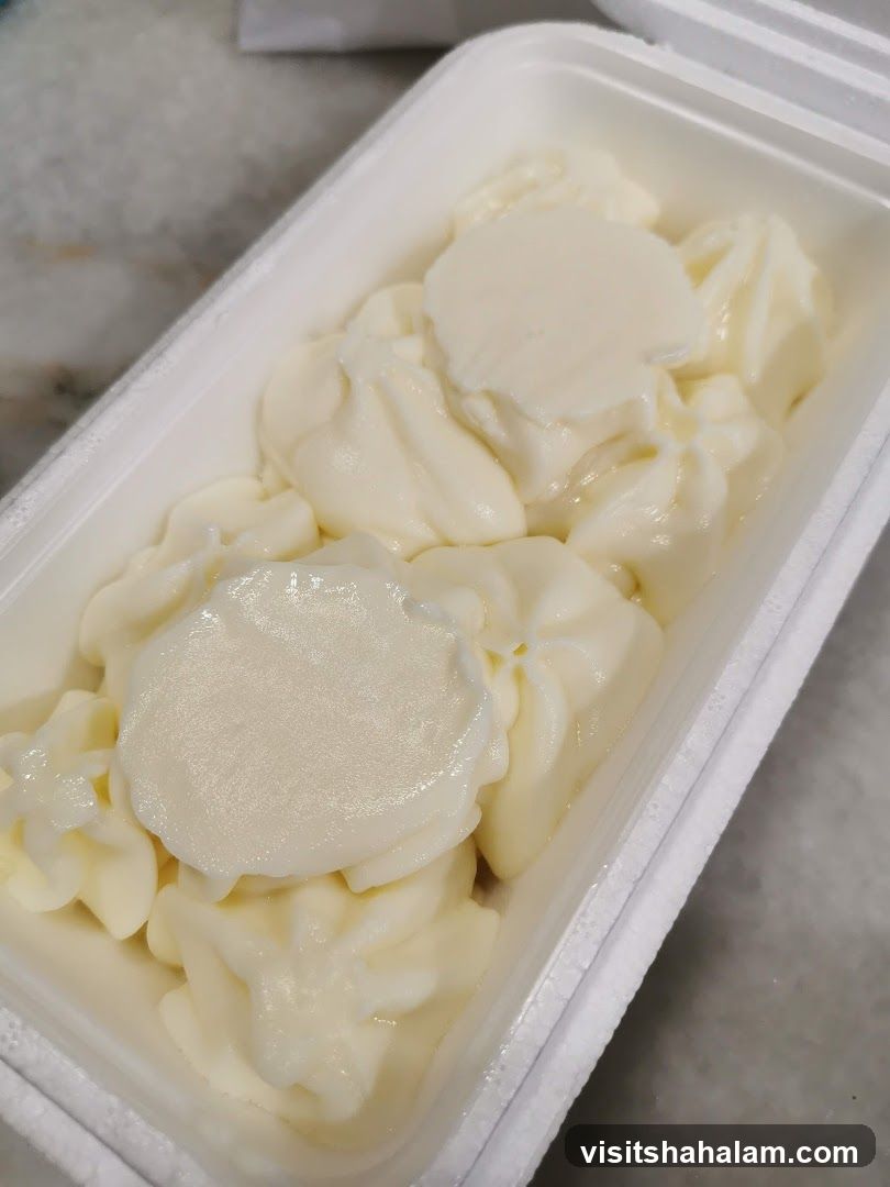 Creamy dessert in a container