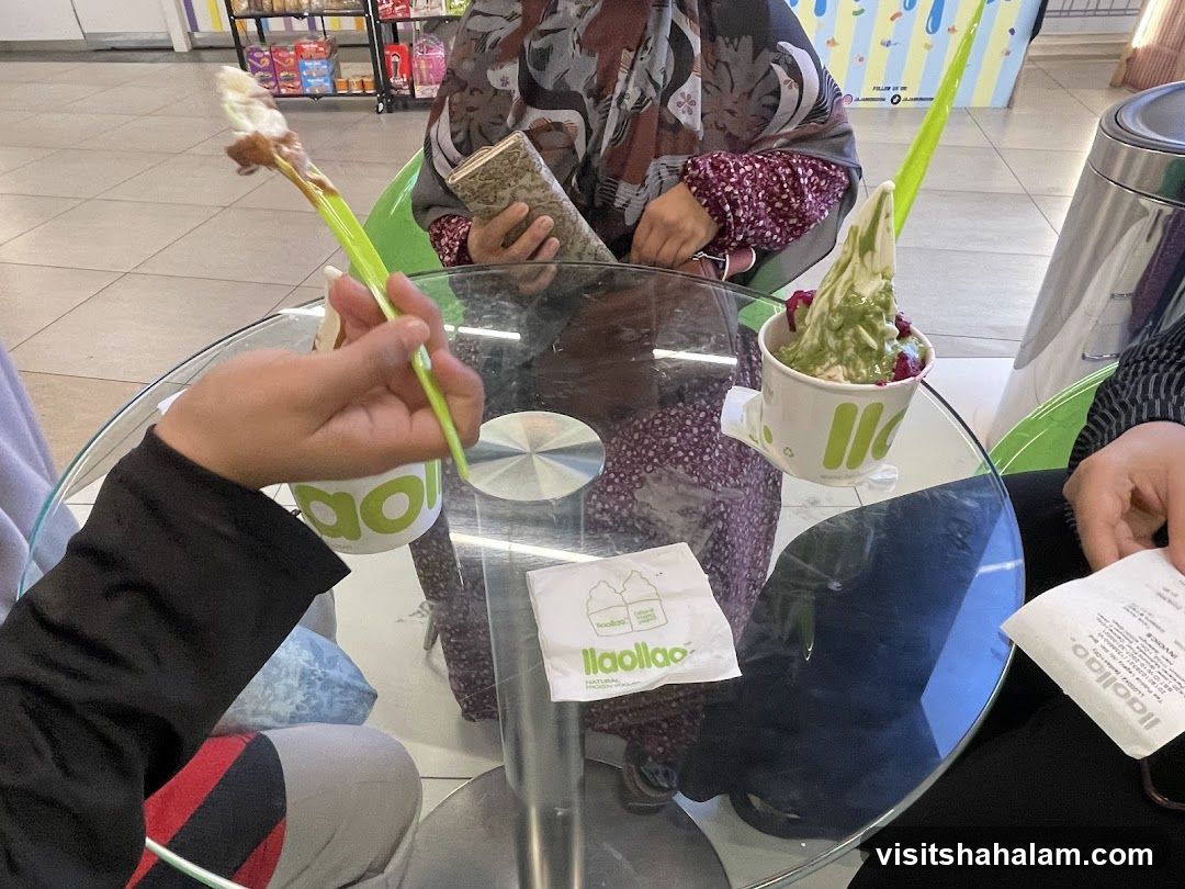 People eating frozen yogurt at a table