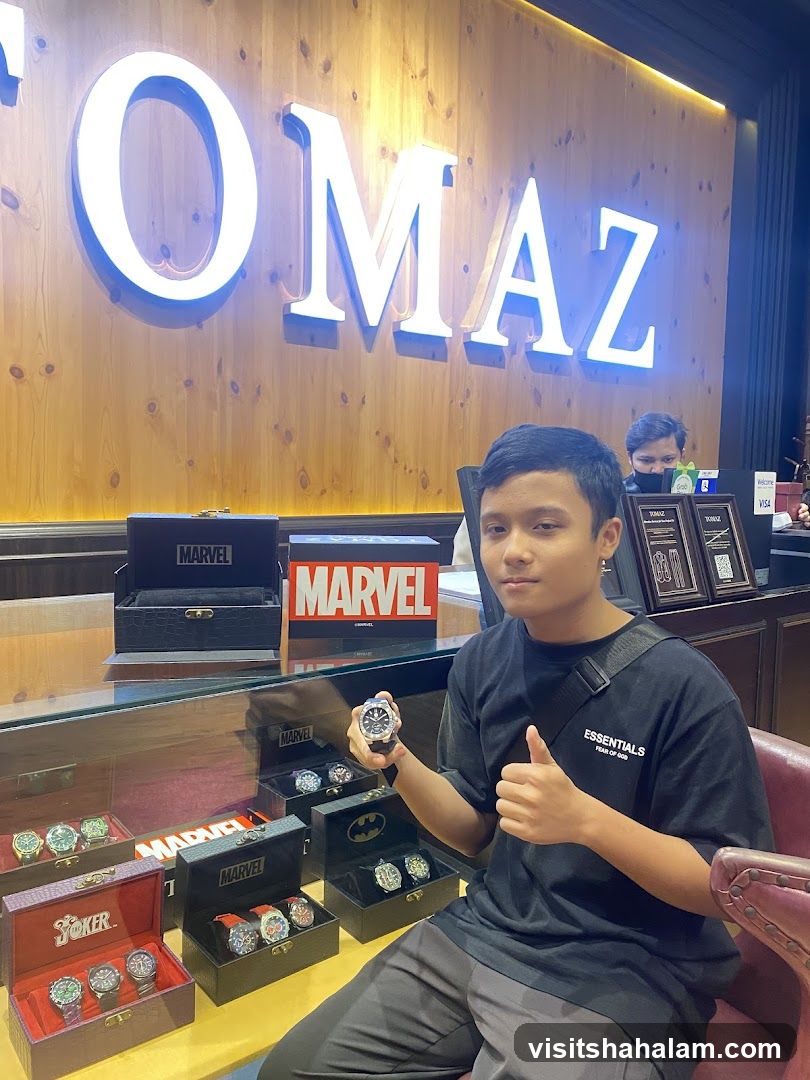 Man Showing Watch in Store
