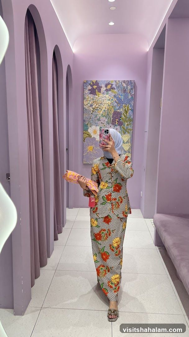 Woman in floral outfit in a boutique