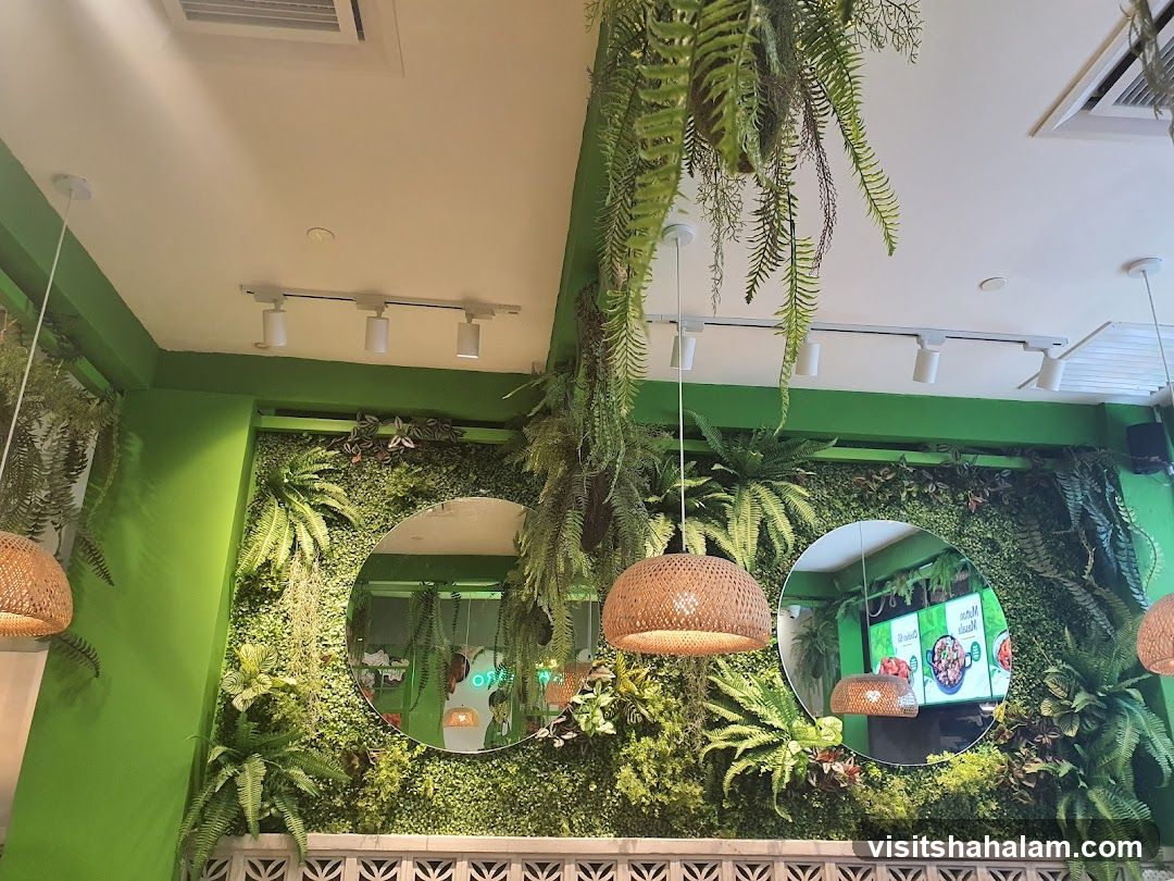 Restaurant Interior with Greenery and Mirrors