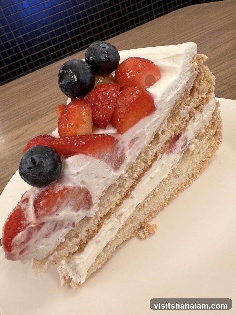 Slice of Strawberry and Blueberry Cake