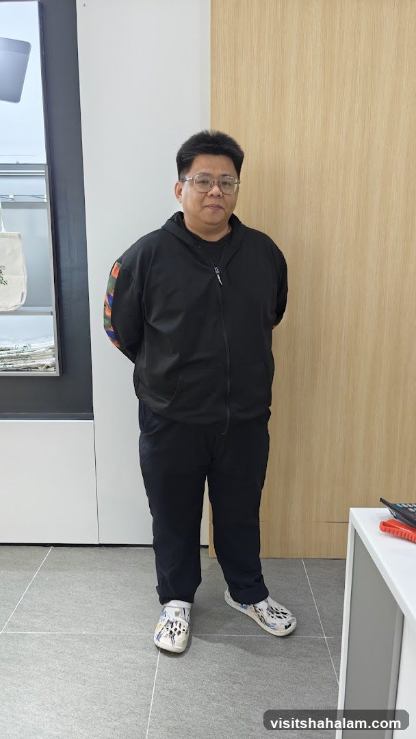 Man in a black hoodie