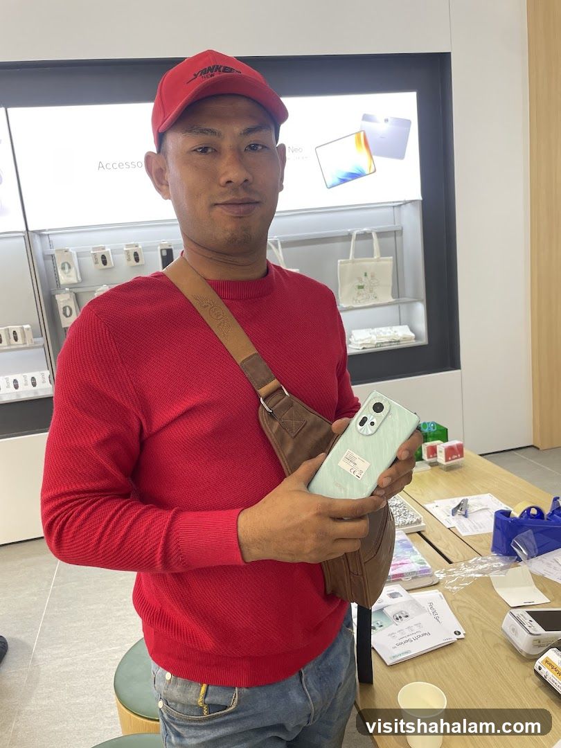 Man holding a smartphone in a store