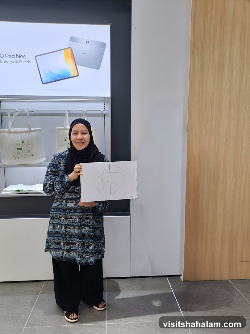Woman holding a box in a store