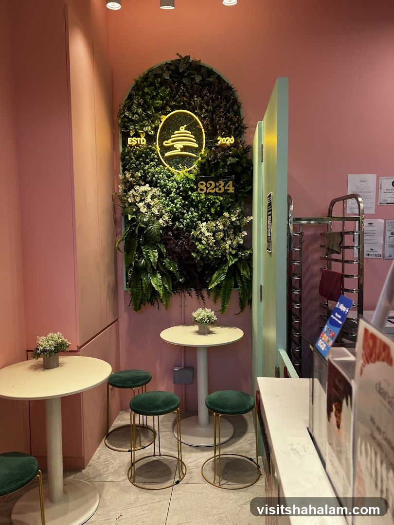 Cafe Interior with Greenery and Neon Sign
