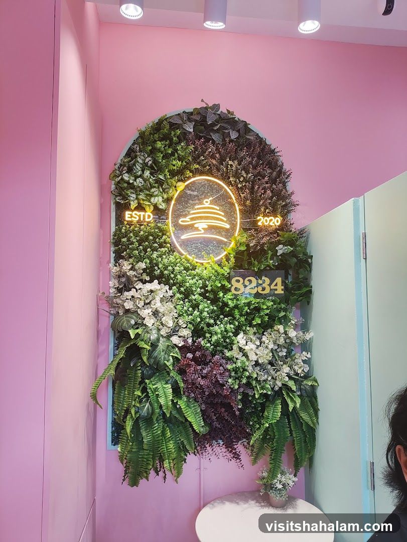 Greenery Wall with Neon Sign