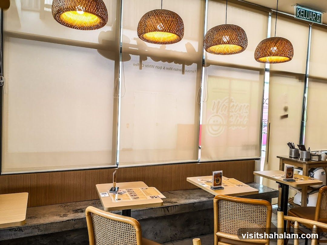 Cafe Interior with Wicker Lamps and Seating