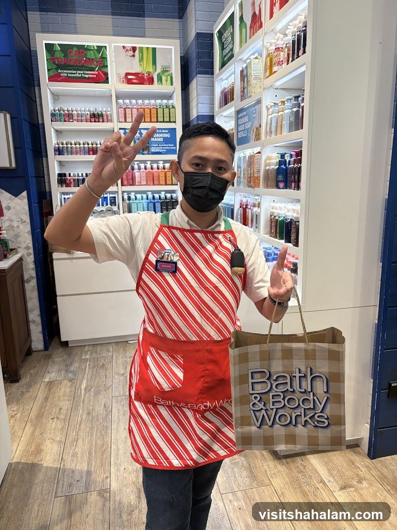 Employee holding a shopping bag