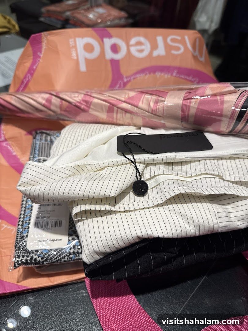 Folded Clothing and Umbrella