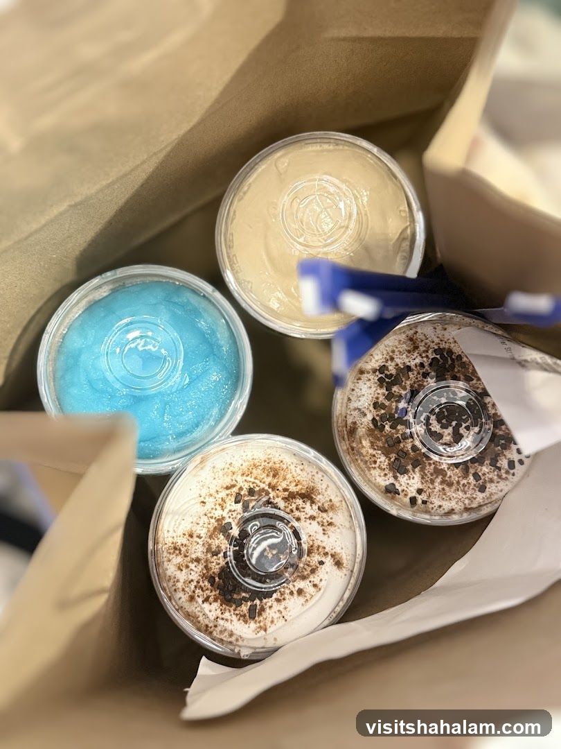 Four drinks in a paper bag