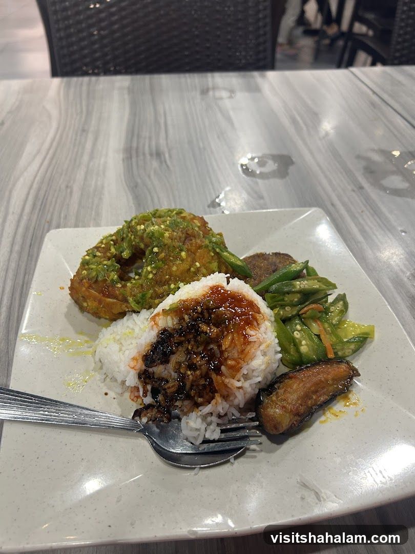 Plate of food with rice and side dishes
