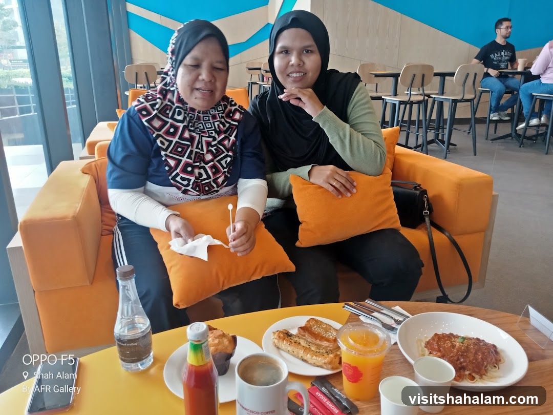 Two women sitting in a cafe