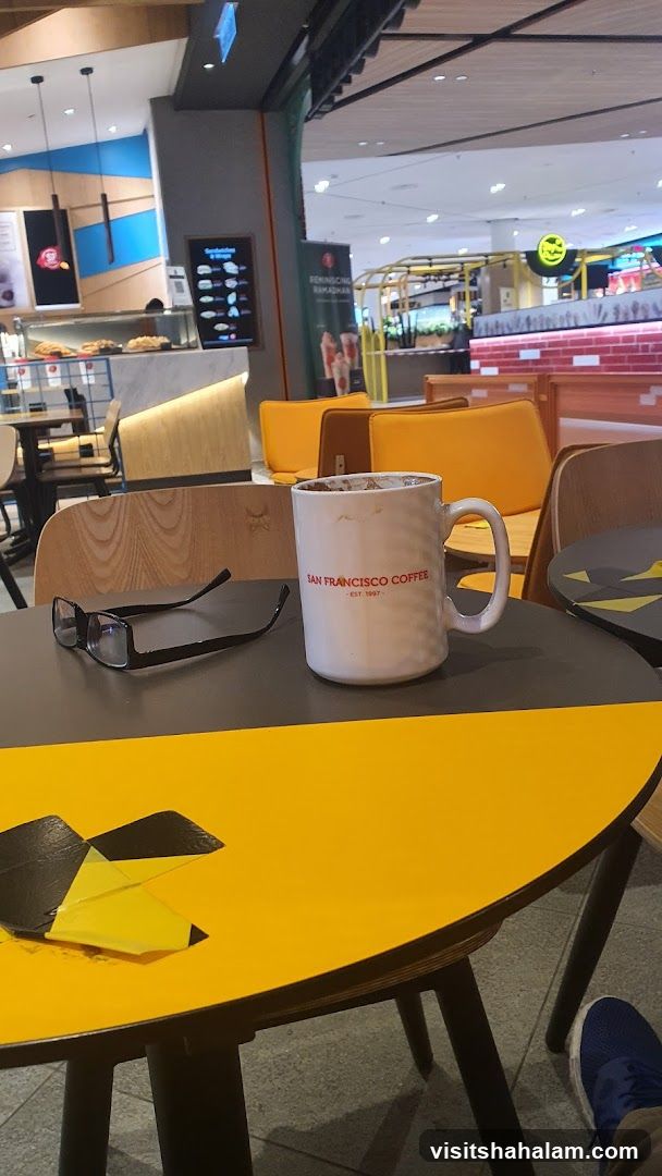Coffee Mug and Glasses on Table