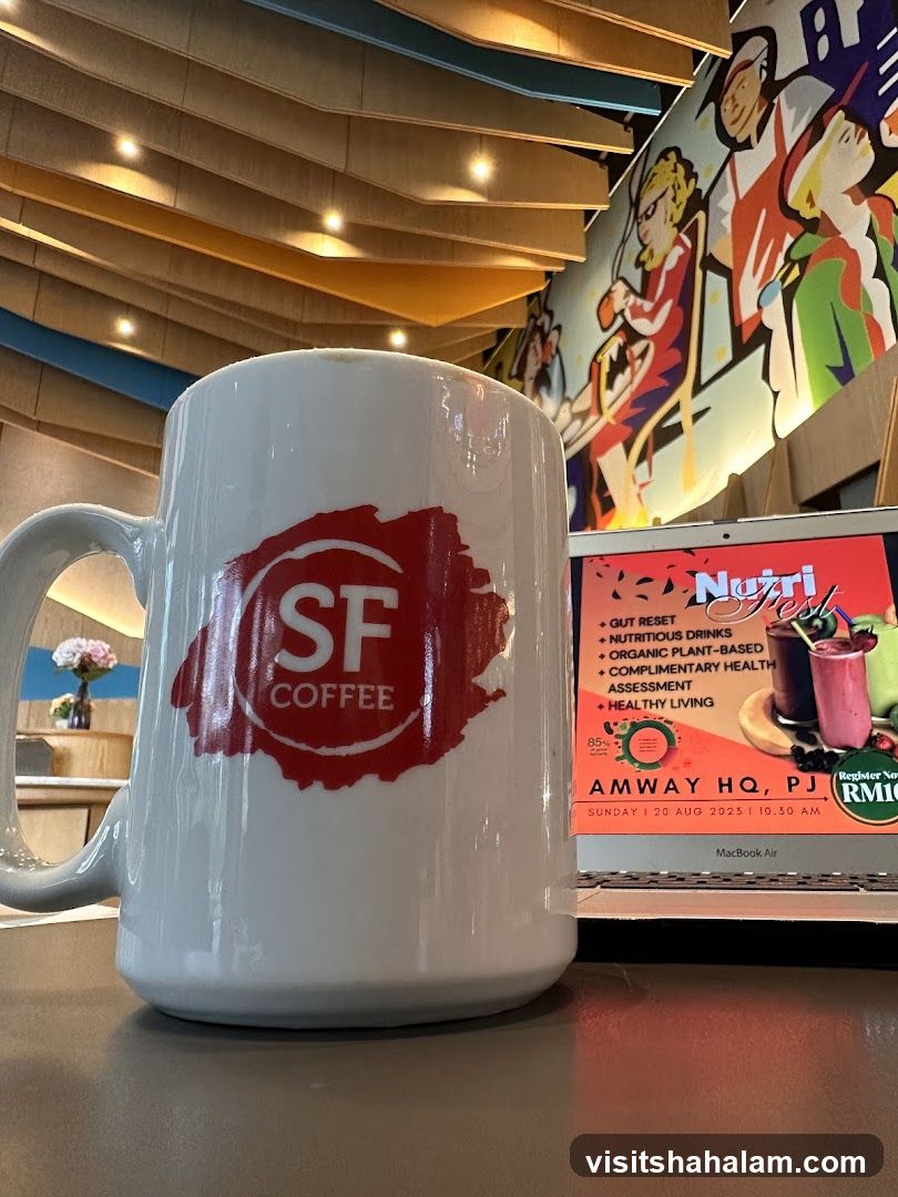 Coffee Mug and Laptop Display